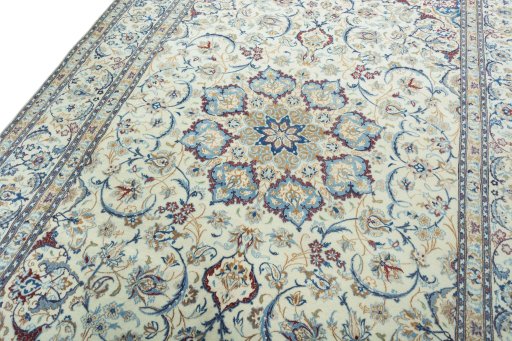 Backside of handmade 2000s Nain rug showing knot structure and weave density
