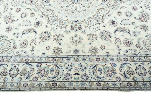 Corner detail of 2000s Nain rug showing border pattern and Wool pile