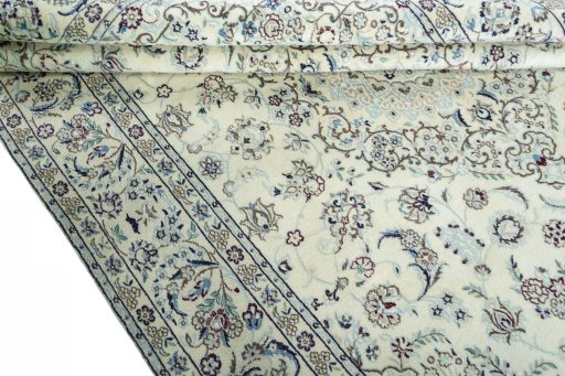 Close-up detail of 2000s Nain rug from Iran / Persia showing Wool weave