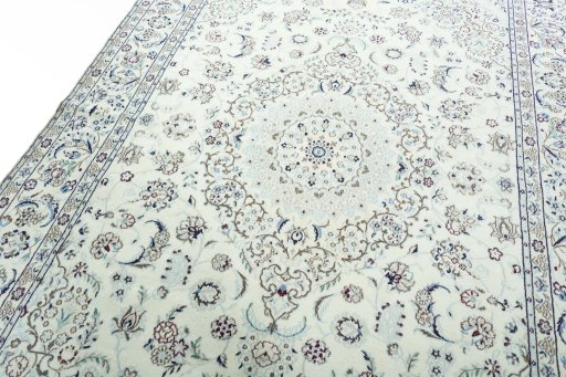 Backside of handmade 2000s Nain rug showing knot structure and weave density