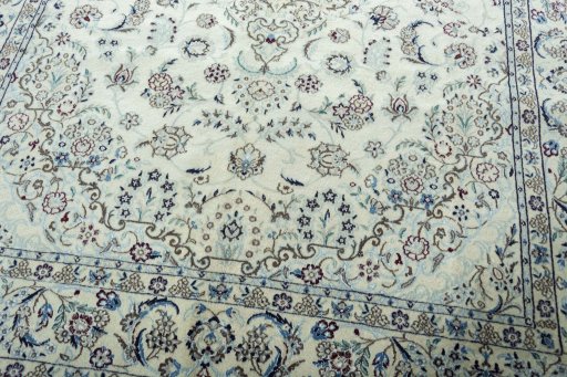 Close-up detail of 2000s Nain rug from Iran / Persia showing Wool weave