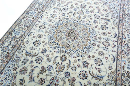 Backside of handmade 2000s Nain rug showing knot structure and weave density