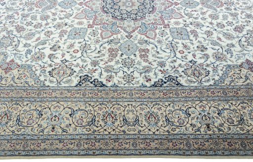 Corner detail of 2000s Nain rug showing border pattern and Cork pile
