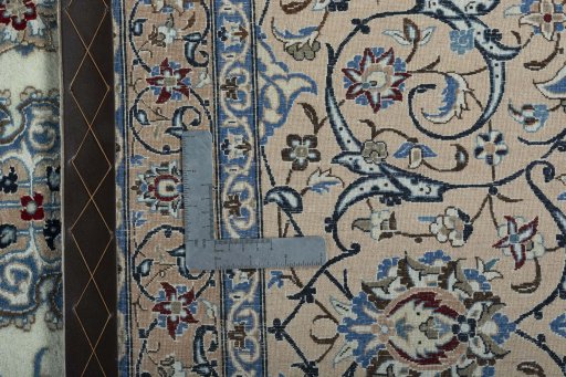 Backside of handmade 2000s Nain rug showing knot structure and weave density