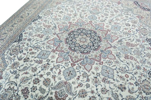 Backside of handmade 2000s Nain rug showing knot structure and weave density