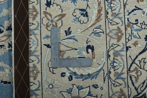 Backside of handmade 2000s Nain rug showing knot structure and weave density