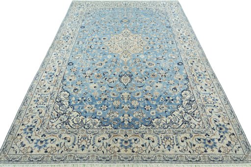 Surface texture of 2000s Nain rug with natural Wool and intricate pattern