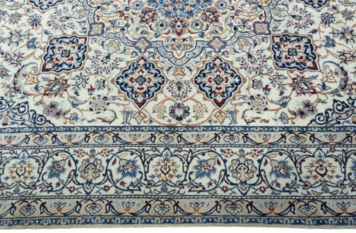 Corner detail of New Nain rug showing border pattern and Wool pile