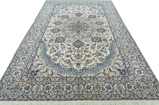 Surface texture of New Nain rug with natural Wool and intricate pattern