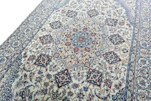 Backside of handmade New Nain rug showing knot structure and weave density