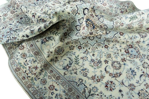 Surface texture of New Nain rug with natural Wool and intricate pattern