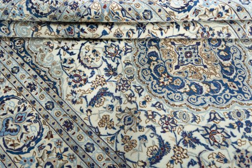 Close-up detail of 2000s Nain rug from Iran / Persia showing Wool weave