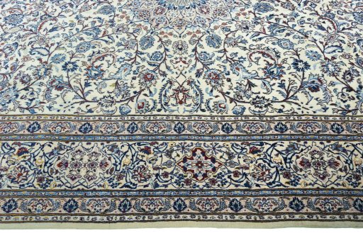 Corner detail of New Nain rug showing border pattern and Wool pile