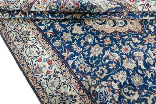 Close-up detail of 2000s Nain rug from Iran / Persia showing Wool weave