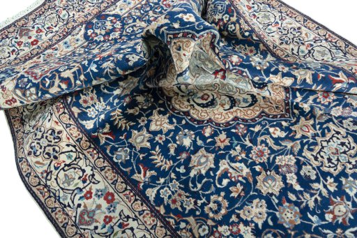 Surface texture of 2000s Nain rug with natural Wool and intricate pattern