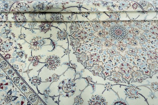 Close-up detail of 2000s Nain rug from Iran / Persia showing Wool weave