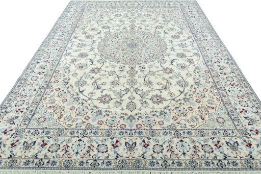 Surface texture of 2000s Nain rug with natural Wool and intricate pattern