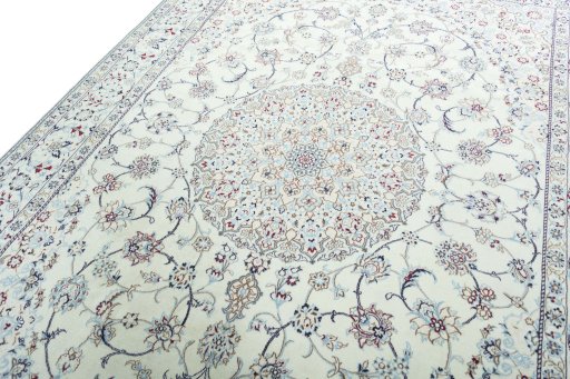 Backside of handmade 2000s Nain rug showing knot structure and weave density