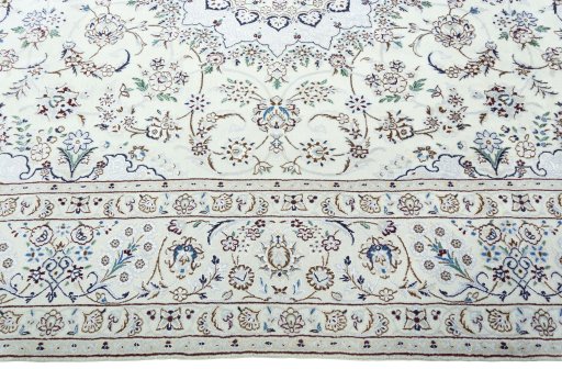 Corner detail of 2000s Nain rug showing border pattern and Wool pile