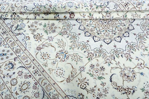 Close-up detail of 2000s Nain rug from Iran / Persia showing Wool weave