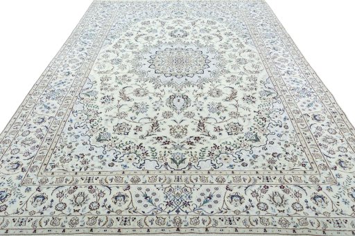 Surface texture of 2000s Nain rug with natural Wool and intricate pattern