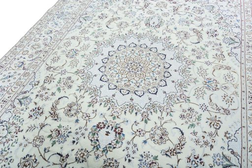 Backside of handmade 2000s Nain rug showing knot structure and weave density