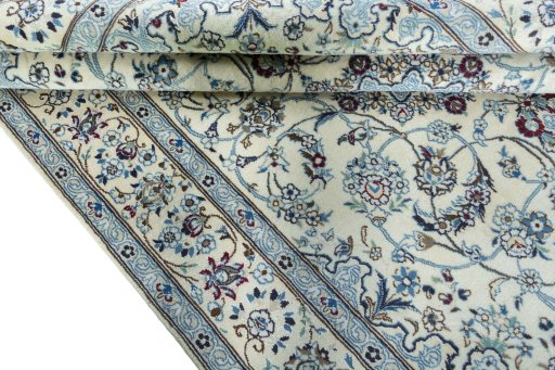 Close-up detail of 2000s Nain rug from Iran / Persia showing Wool weave