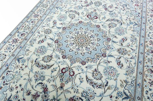 Backside of handmade 2000s Nain rug showing knot structure and weave density