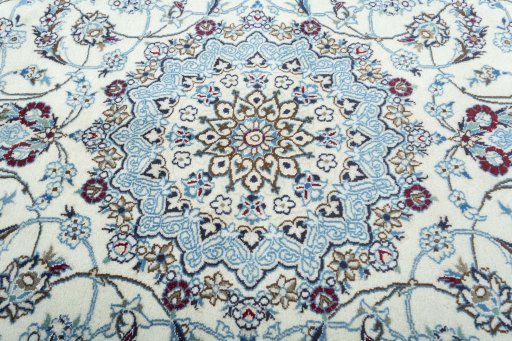 Central medallion detail of 2000s Nain rug from Iran / Persia