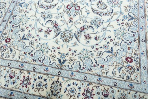 Close-up detail of 2000s Nain rug from Iran / Persia showing Wool weave