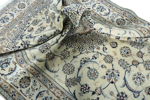 Surface texture of New Nain rug with natural Wool and intricate pattern