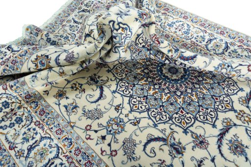 Surface texture of 2000s Nain rug with natural Wool and intricate pattern