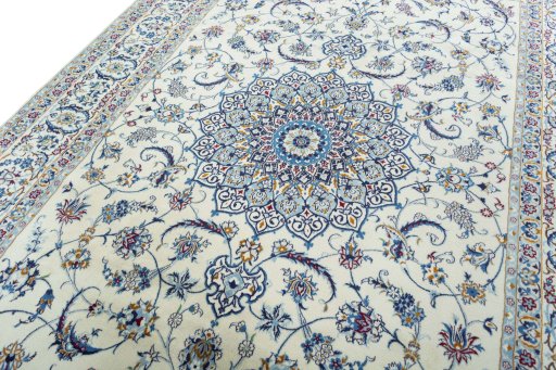 Backside of handmade 2000s Nain rug showing knot structure and weave density