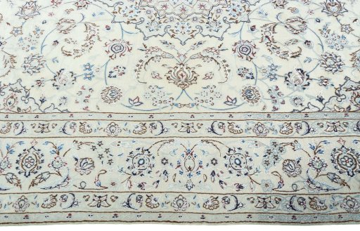 Corner detail of New Nain rug showing border pattern and Wool pile