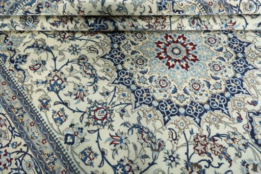 Close-up detail of 2000s Nain rug from Iran / Persia showing Wool weave