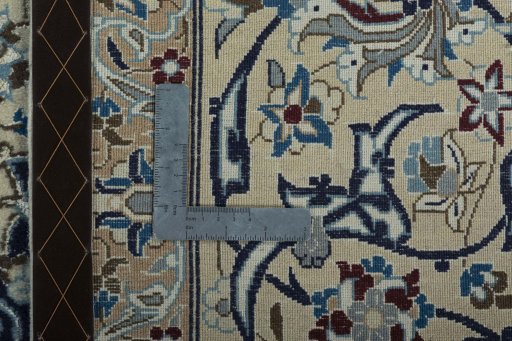 Backside of handmade 2000s Nain rug showing knot structure and weave density