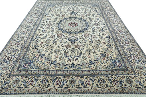 Surface texture of 2000s Nain rug with natural Wool and intricate pattern