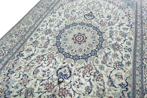Backside of handmade 2000s Nain rug showing knot structure and weave density