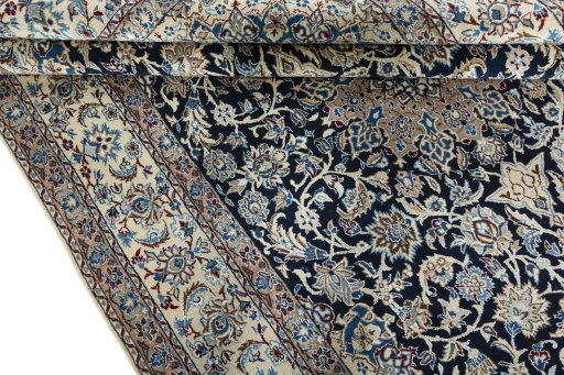 Close-up detail of 2000s Nain rug from Iran / Persia showing Wool weave