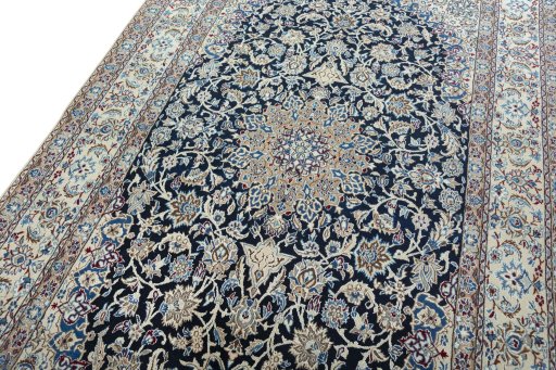 Backside of handmade 2000s Nain rug showing knot structure and weave density