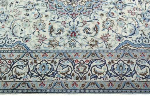 Corner detail of Unknown Nain rug showing border pattern and Wool pile