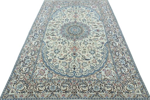 Surface texture of Unknown Nain rug with natural Wool and intricate pattern