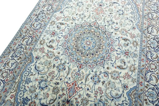 Backside of handmade Unknown Nain rug showing knot structure and weave density
