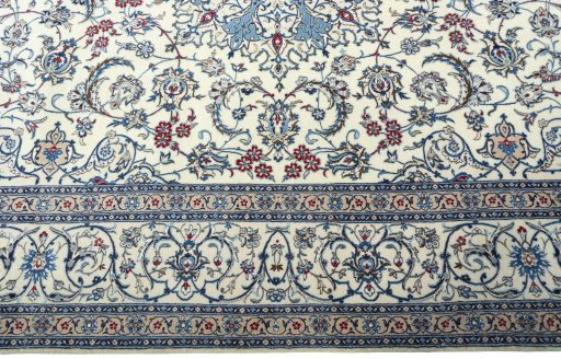 Corner detail of 2000s Nain rug showing border pattern and Cork pile