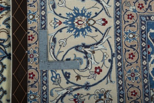 Backside of handmade 2000s Nain rug showing knot structure and weave density
