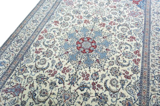 Backside of handmade 2000s Nain rug showing knot structure and weave density