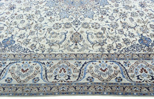 Corner detail of 2000s Nain rug showing border pattern and Wool pile