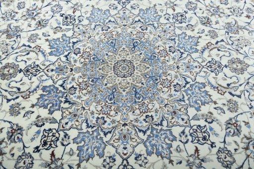 Central medallion detail of 2000s Nain rug from Iran / Persia