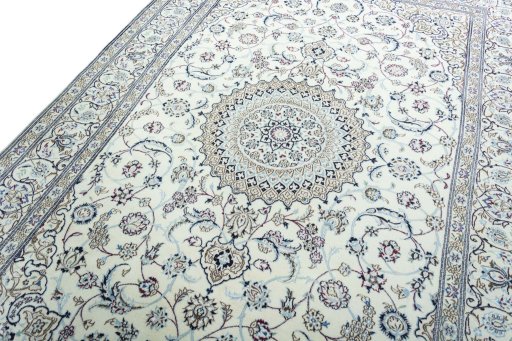 Backside of handmade 2000s Nain rug showing knot structure and weave density