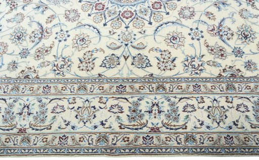 Corner detail of New Nain rug showing border pattern and Wool pile